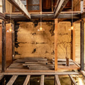 atrium at the center, with the old air-raid shelter below