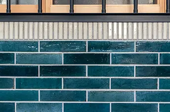 The deep green tiles